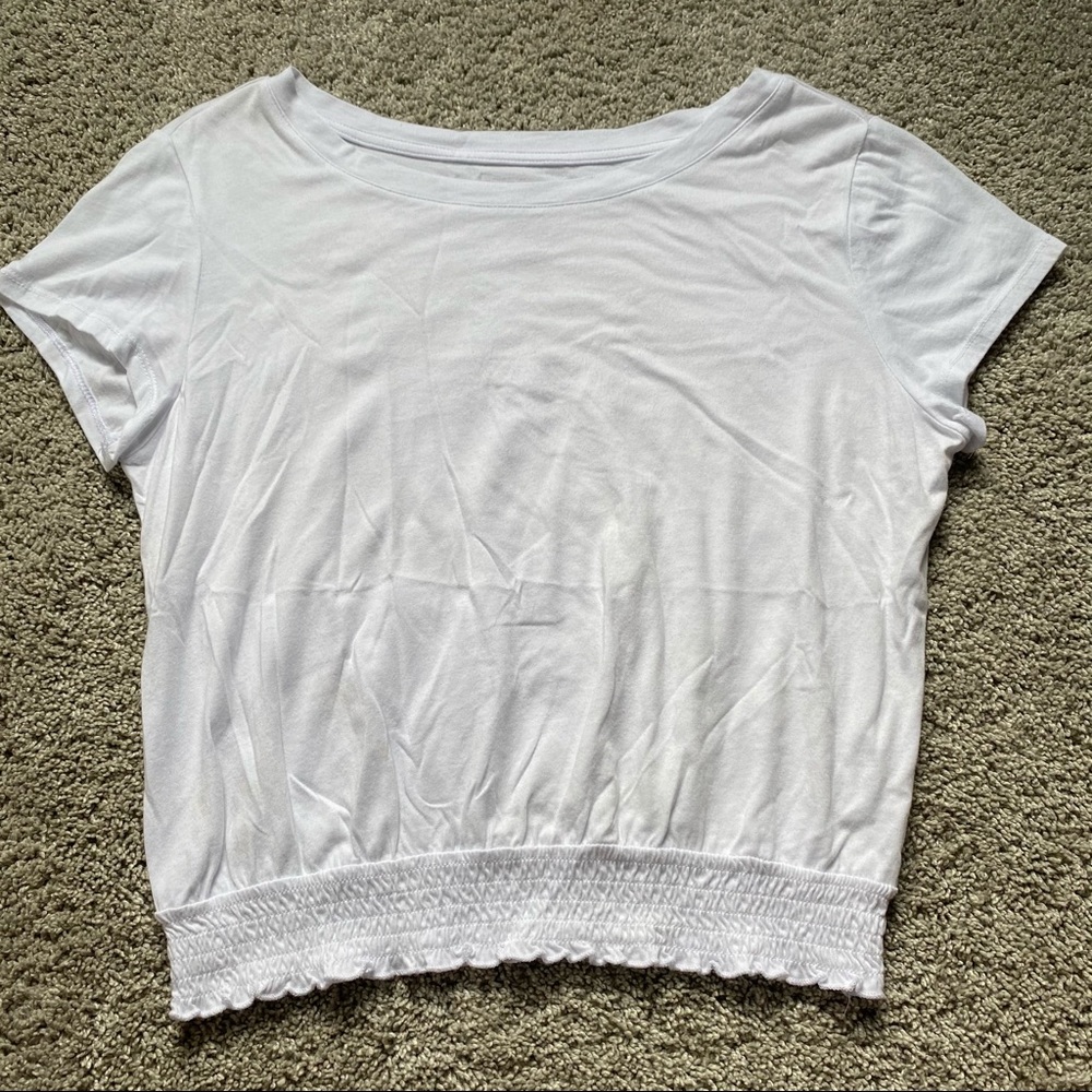 Plain white T-shirt size large.